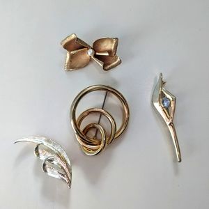 Lot of Four Vintage Gold Toned Brooches - One is signed Gerry's